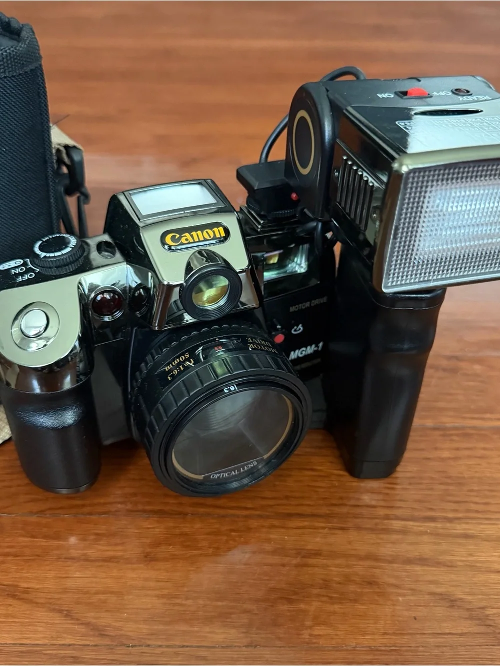 Canon Black Vintage SLR Camera with External Flash - Black